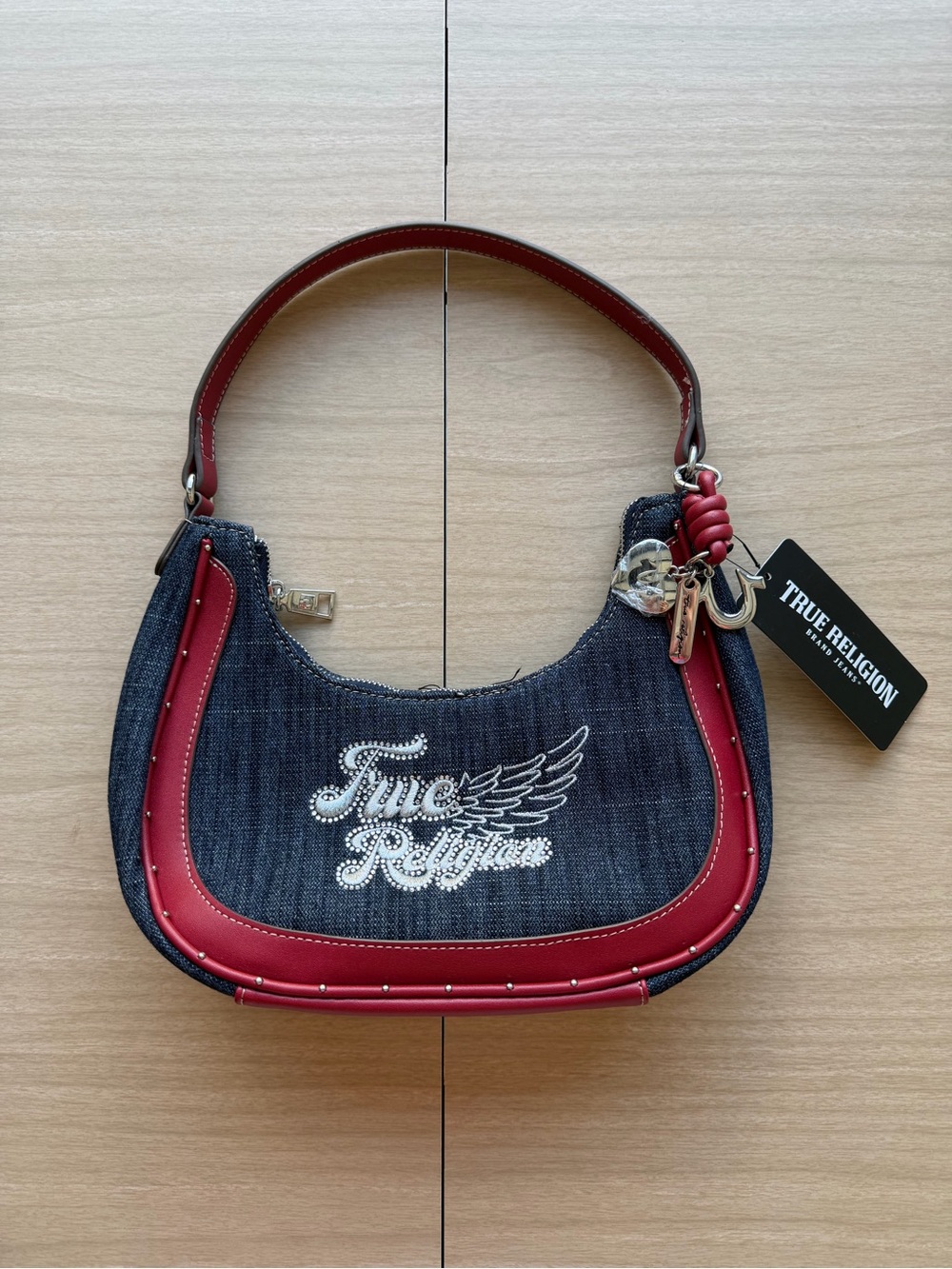 True Religion Women’s Denim Shoulder Bag with Red Trim and Embroidered Logo